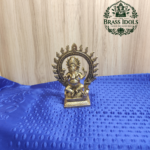 Brass Seated Ganesha Idol with Prabhavali Frame 6.8 Inch